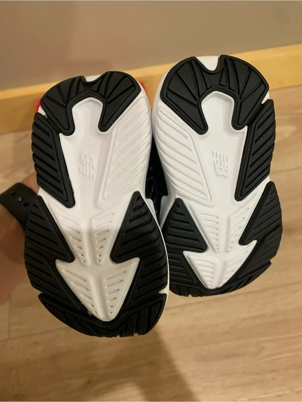 LIKE NEW New Balance baby Black and White Velcro Athletic Sneakers